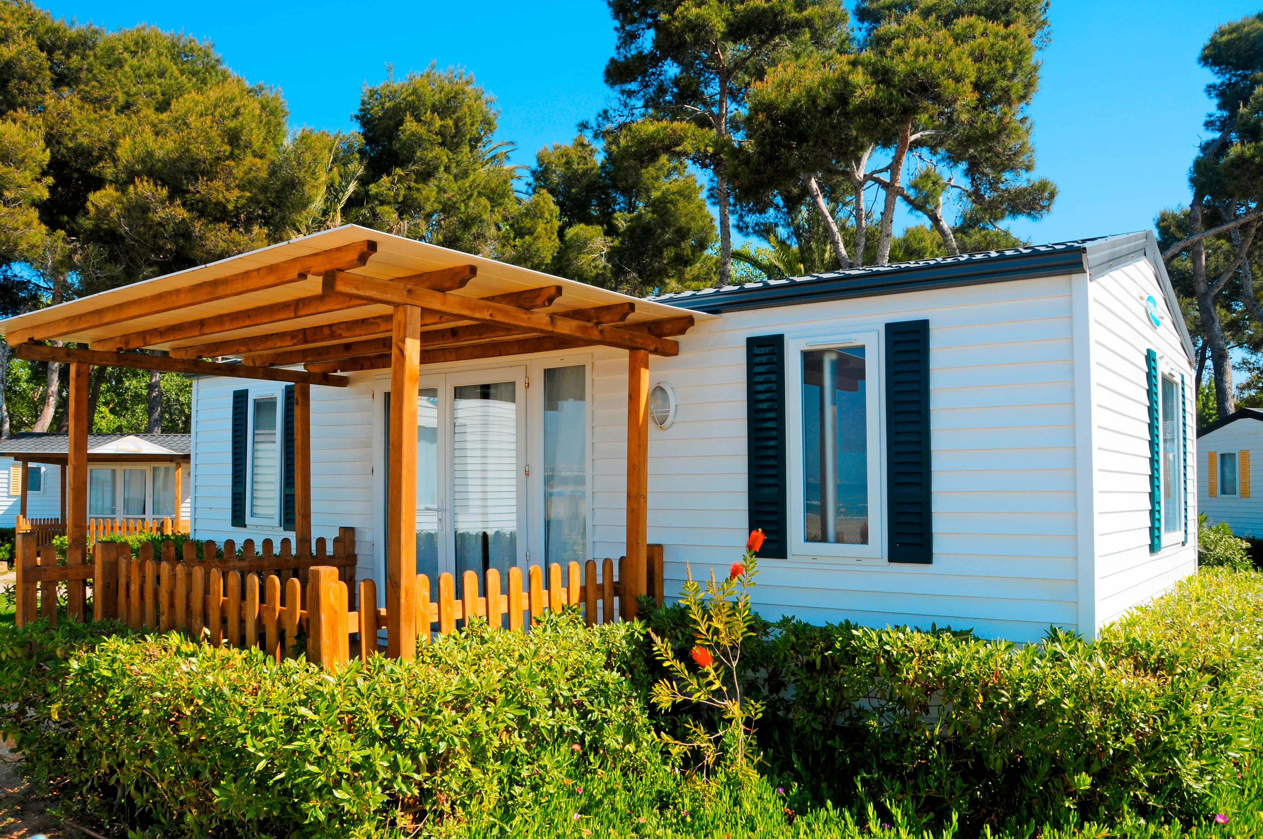 Mobile home exterior with blue sky background
